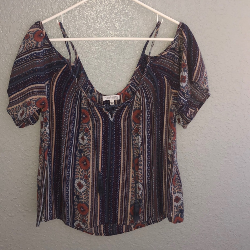 A colorful off the shoulder sleeve blouse